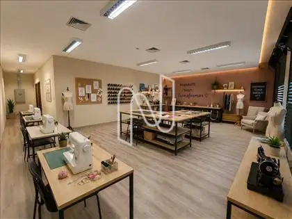  Foto demonstrativa de uma escola de costura 