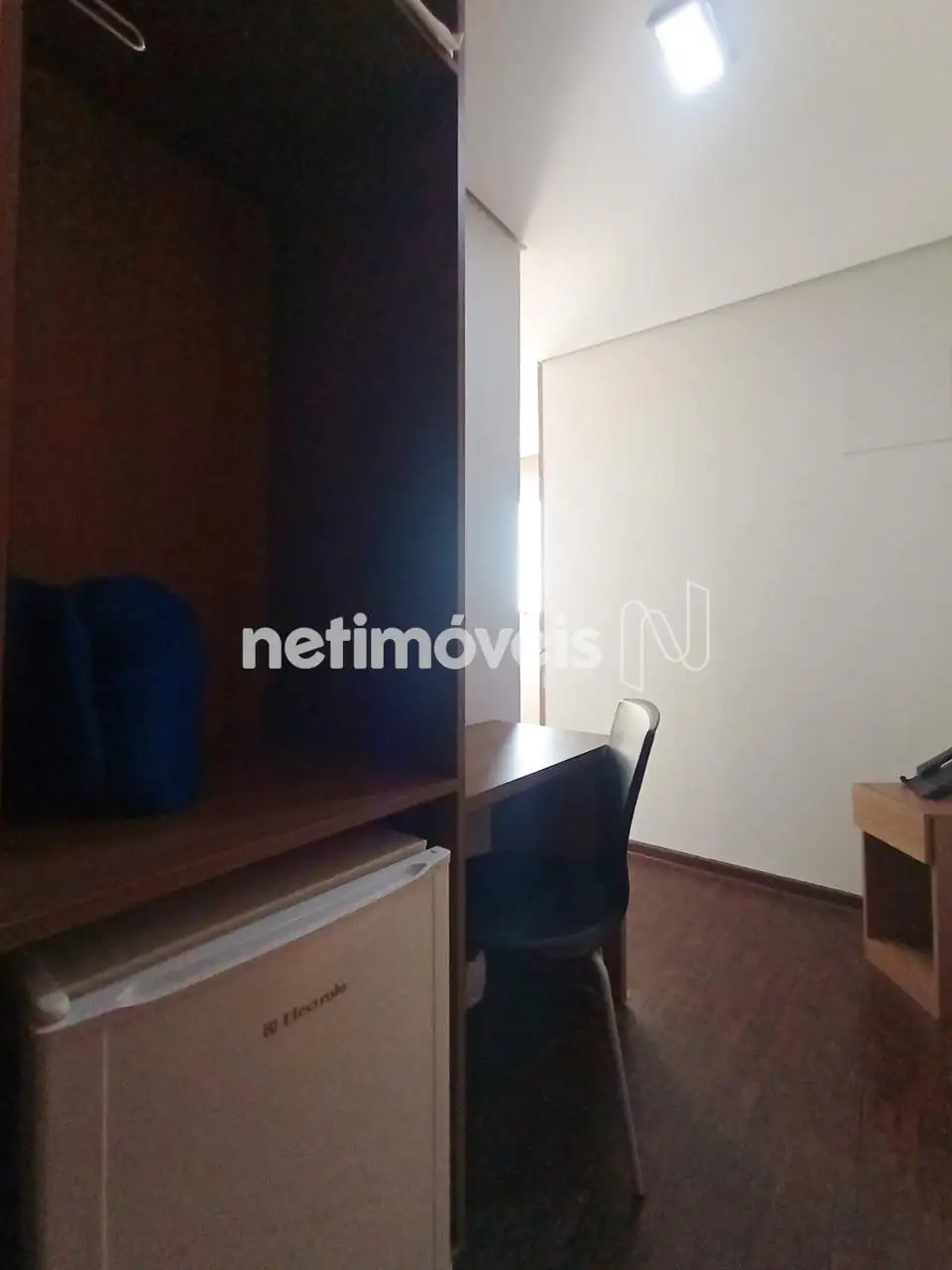 Entrada do quarto e frigobar