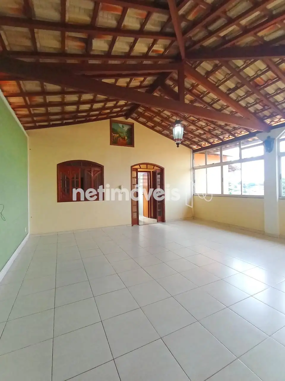 Salão para tv, jantar e cozinha americana