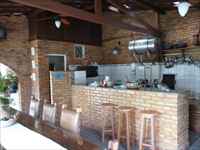 Espaço gourmet completo estilo rústico