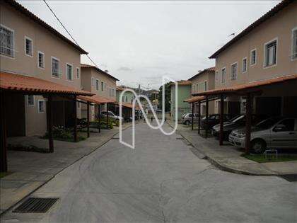 Entrada do condomínio e vagas de garagem