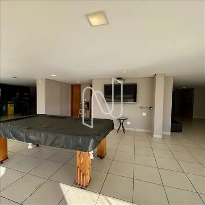 Salão de jogos com tv