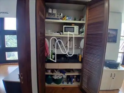 Cozinha dentro do armário