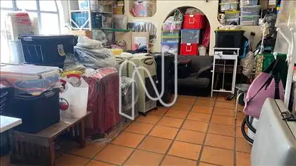  Quarto de despejo junto à garagem
