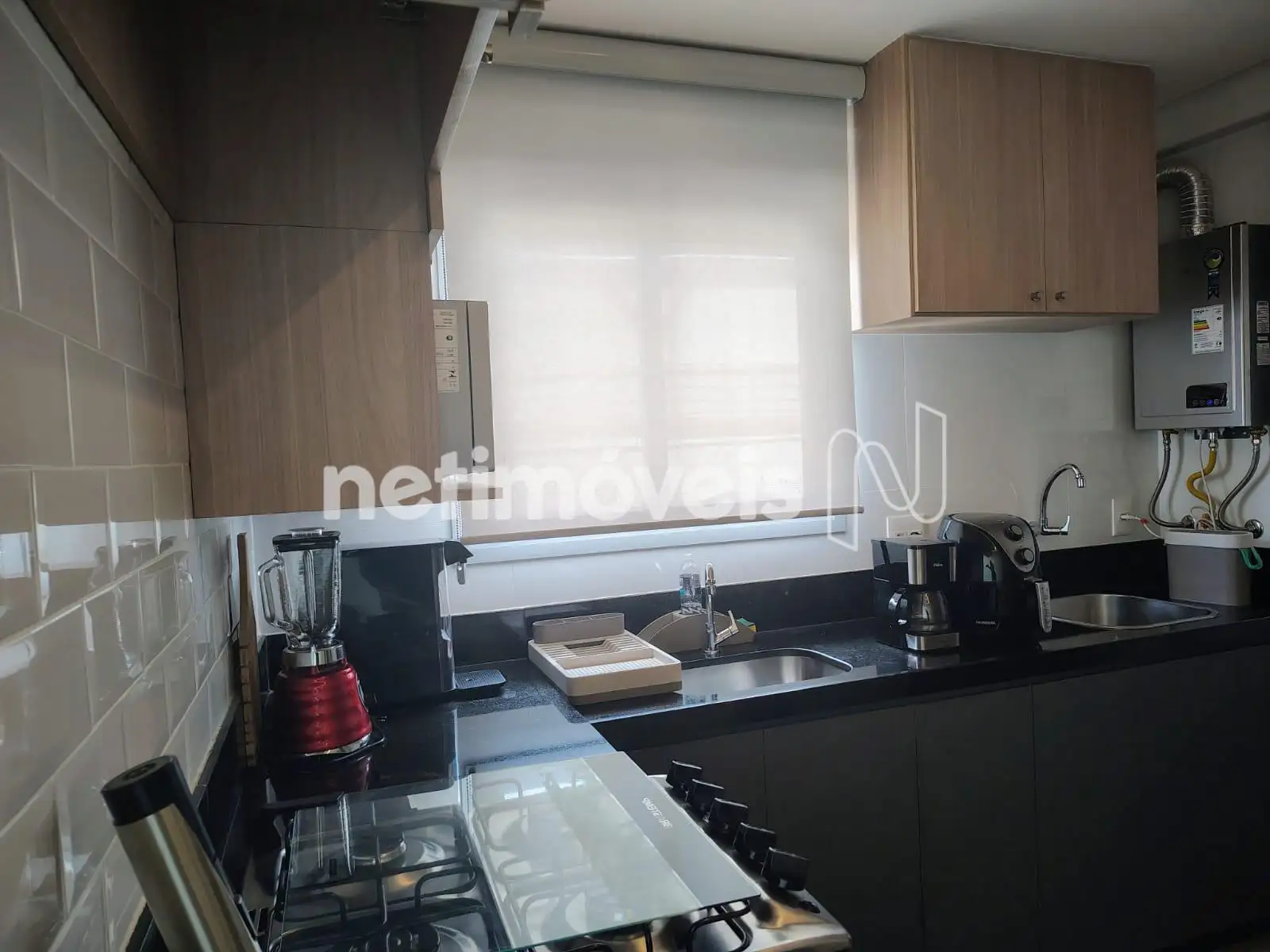 Cozinha com bancada em granito
