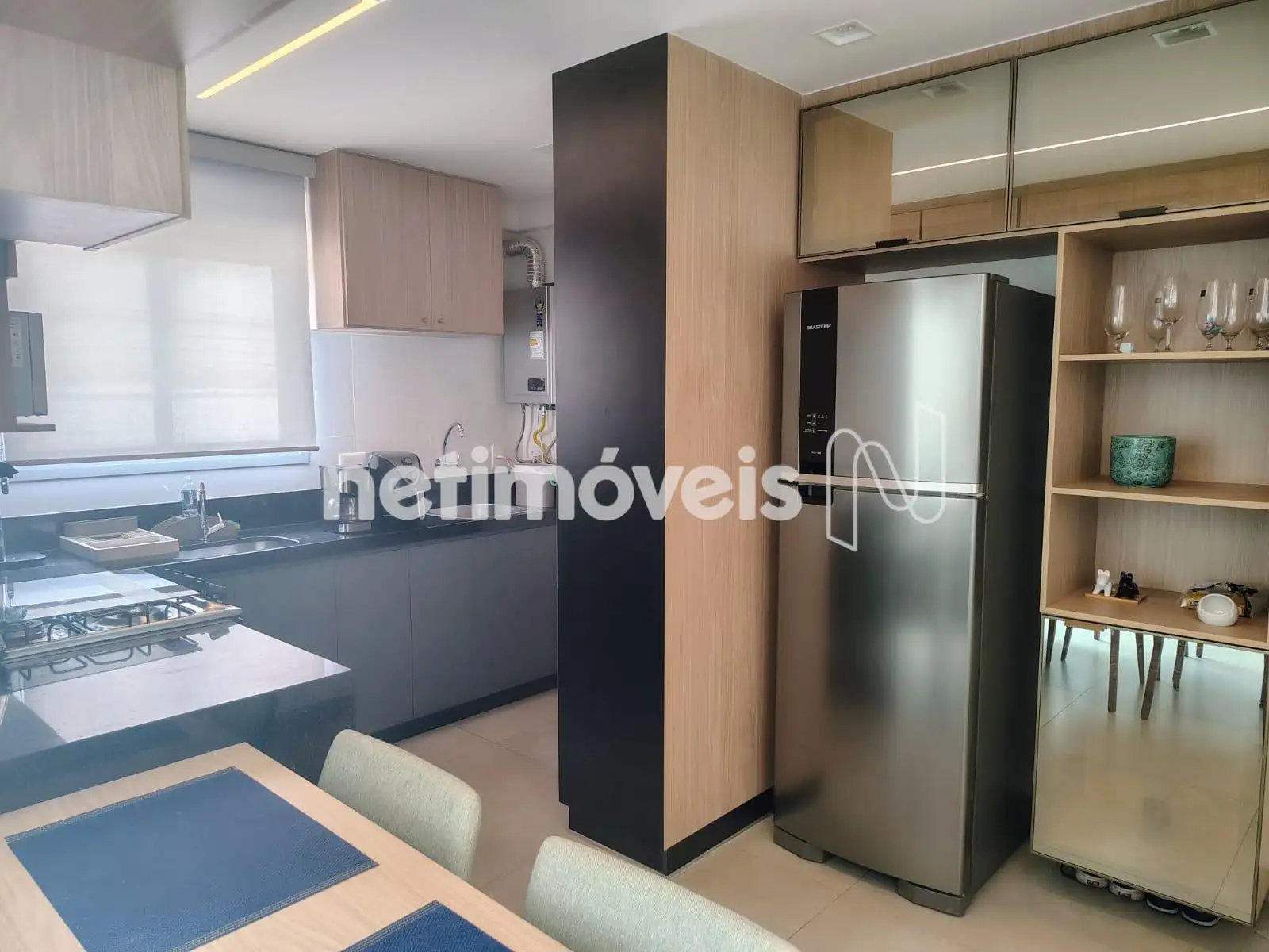 Espaço mesa jantar/cozinha