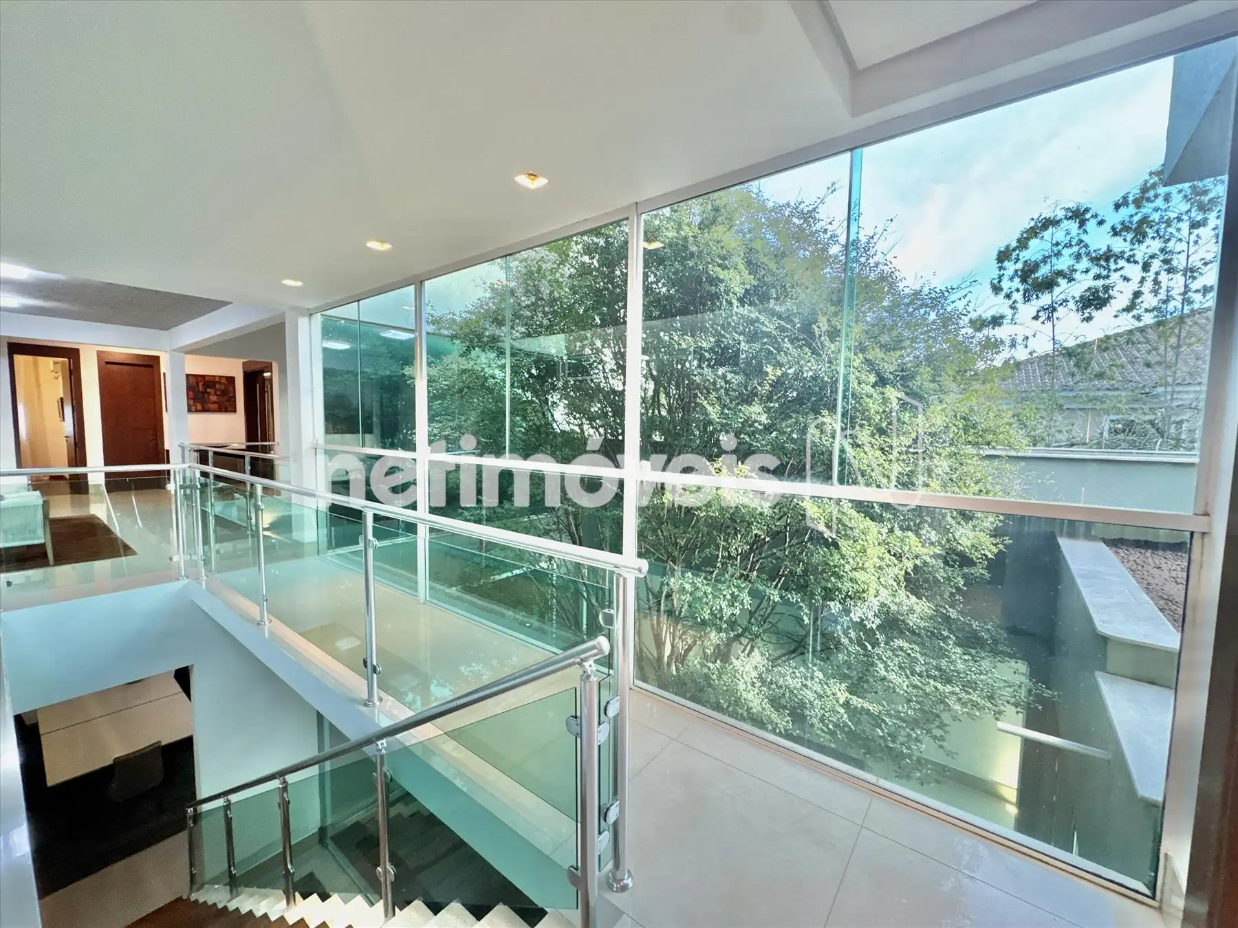 Segundo andar, vista jardim de inverno