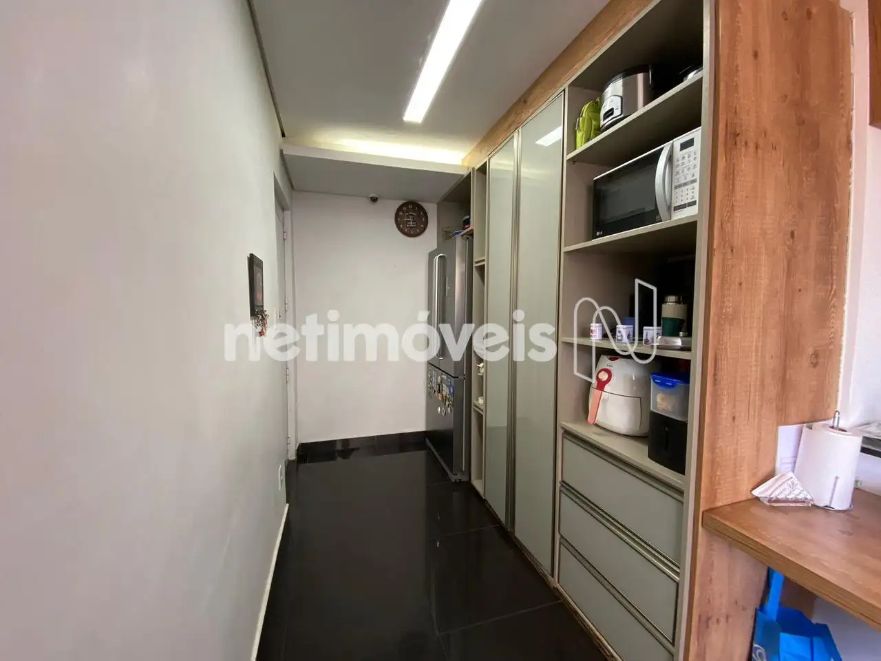 1o. andar: Cozinha com armários - A