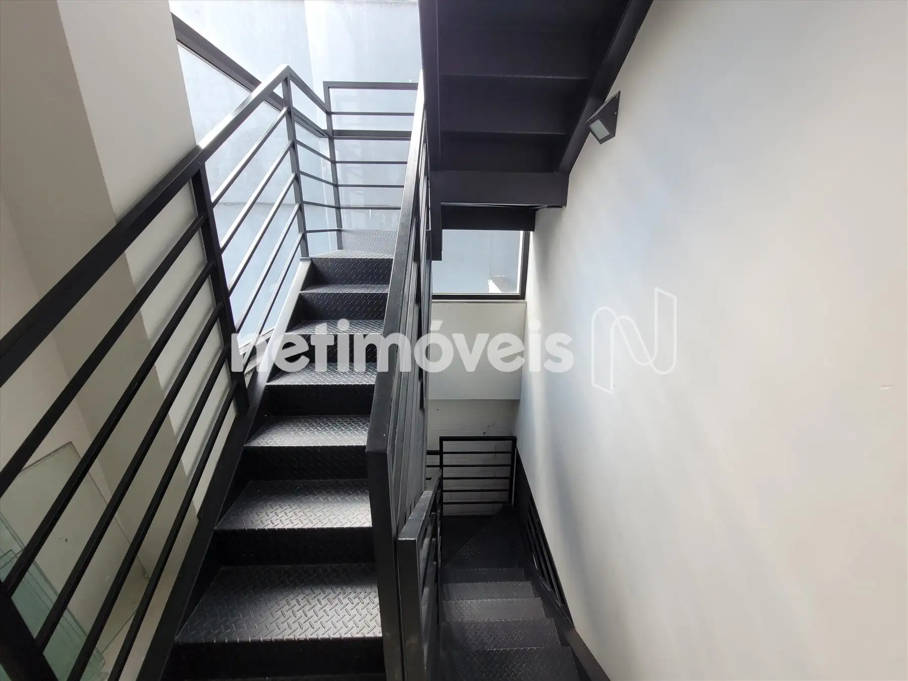 1o. Andar: Escadas para garagem e 2o. andar