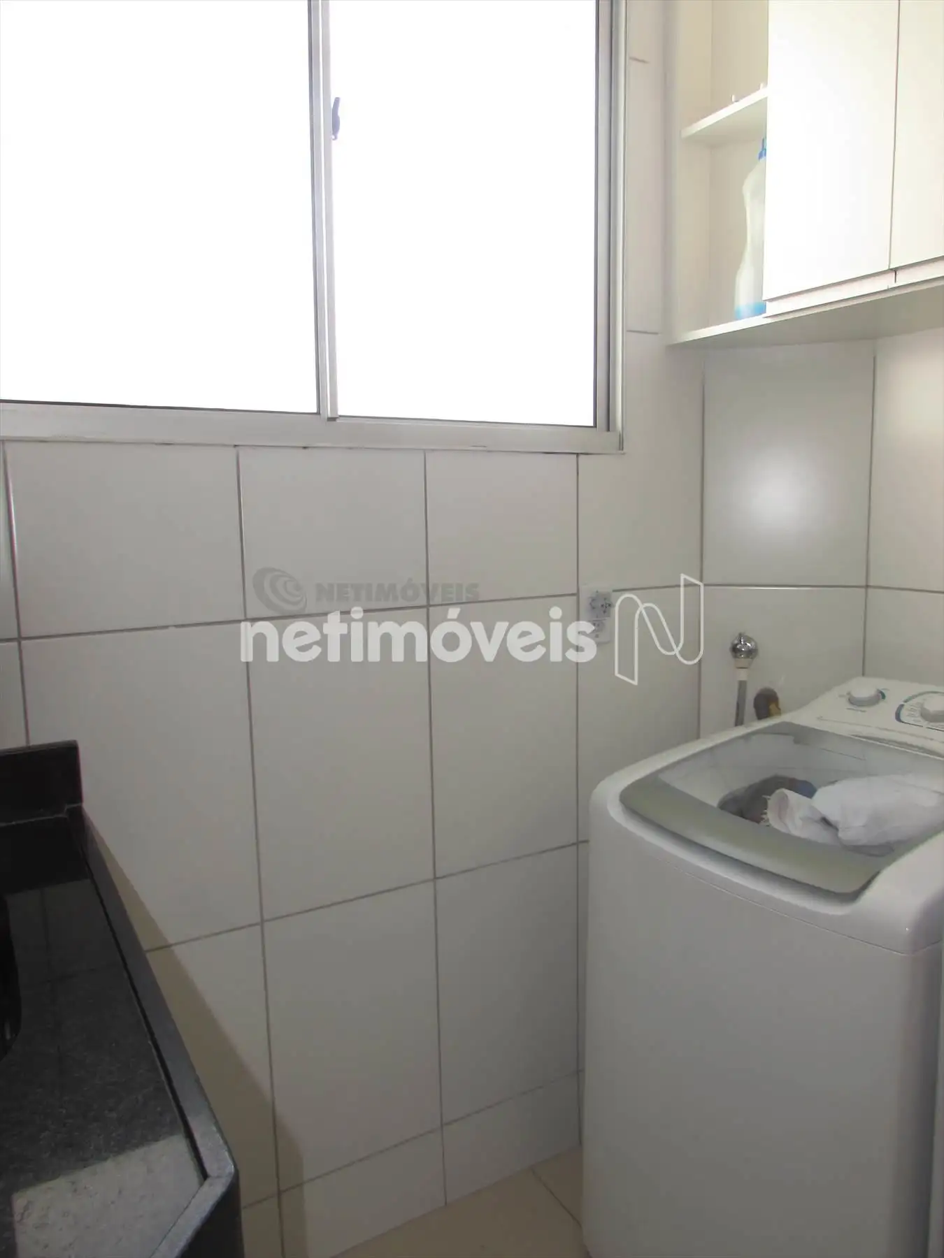 Área de serviço conjugada com a cozinha