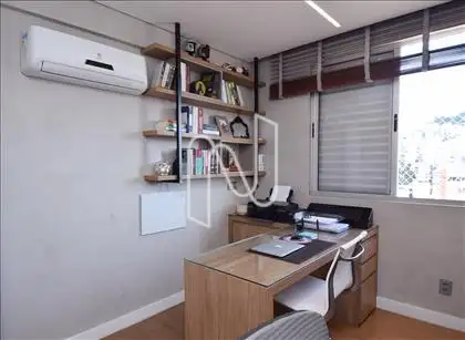Quarto 02: escritório com ar condicionado