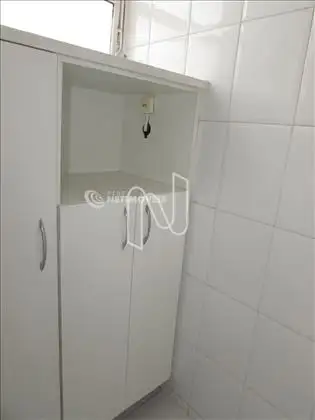 Área de serviços com armário 