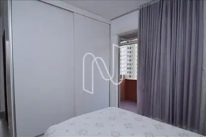 Quarto suíte com armário e varanda