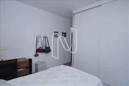 Quarto suíte com armário e varanda 