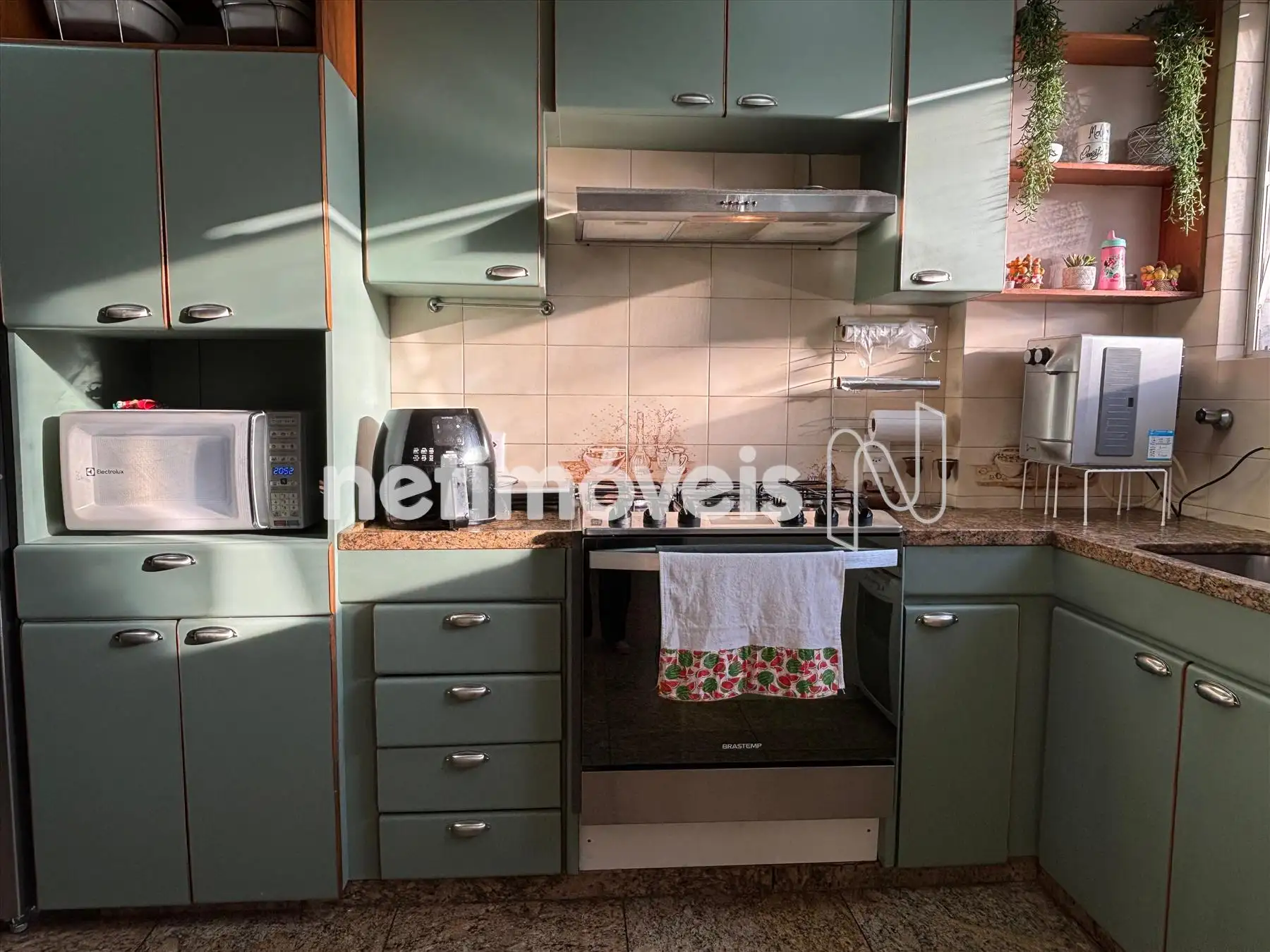 Cozinha com armários planejados