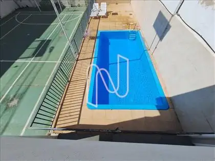 Vista do espaço gourmet para quadra, piscina
