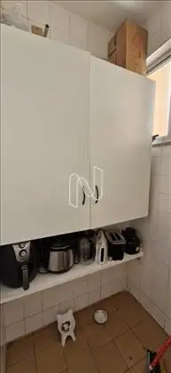 Banheiro da área transformado em despensa