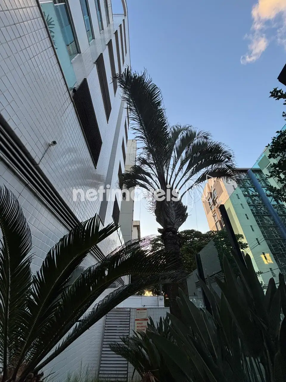 Fachada revestida e Jardim