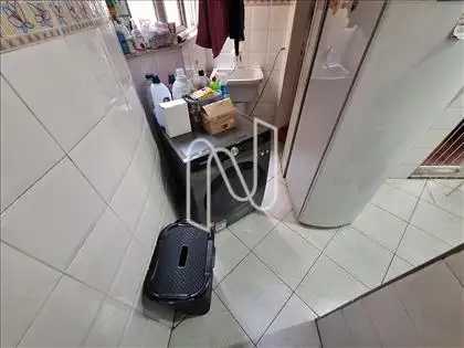 Área de serviços com banheiro