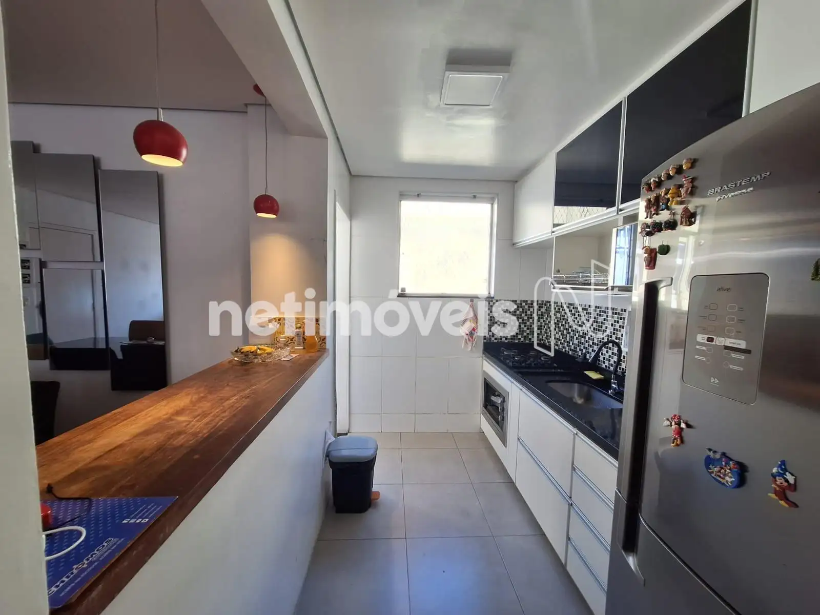 Cozinha integrada com a sala