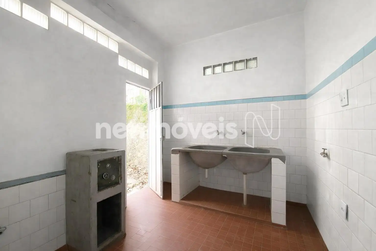 Área de serviço. (IA)