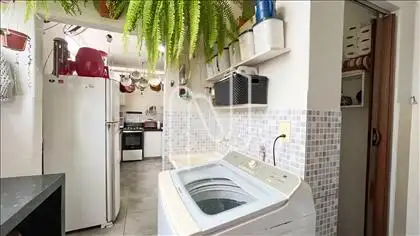 Área de serviço com banheiro