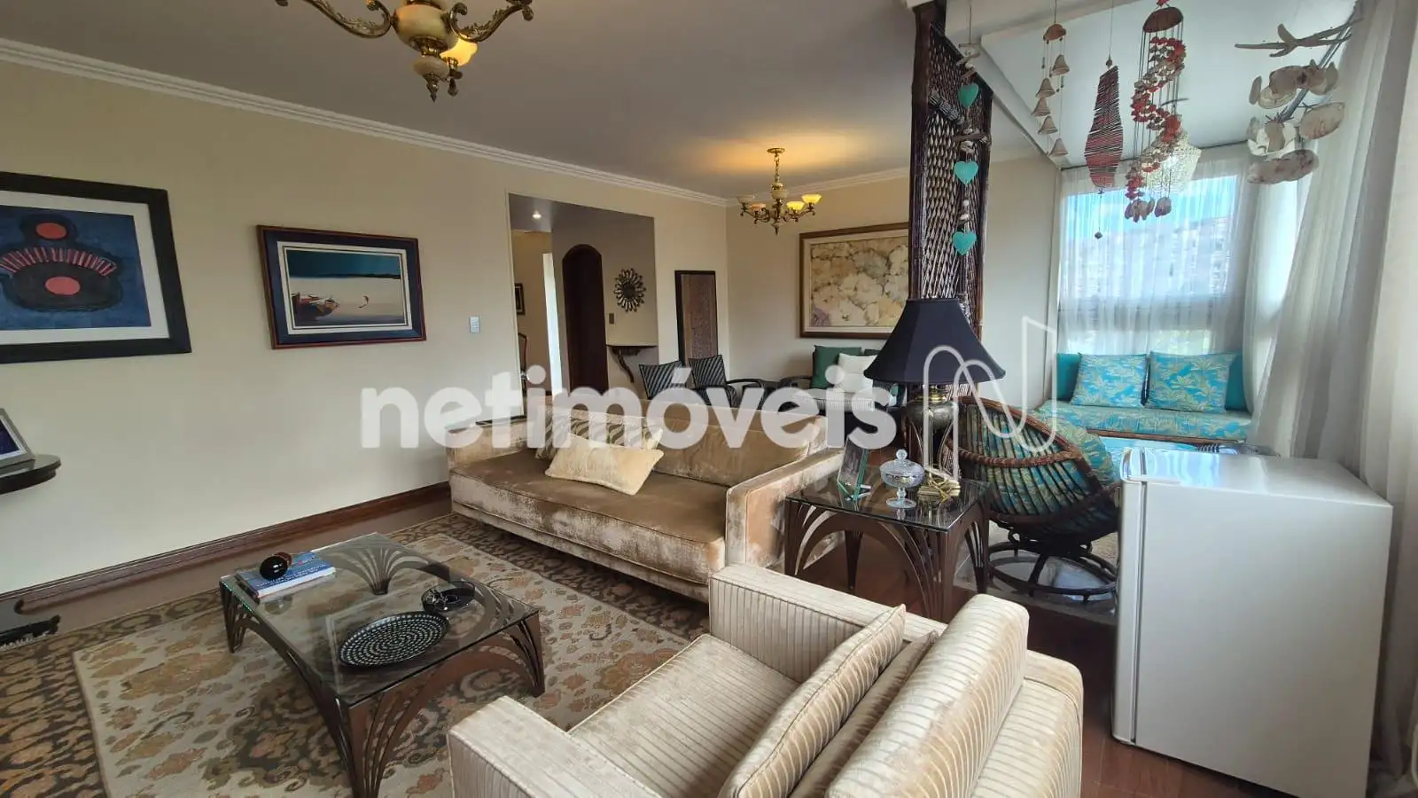 Sala vários ambientes com varanda integrada