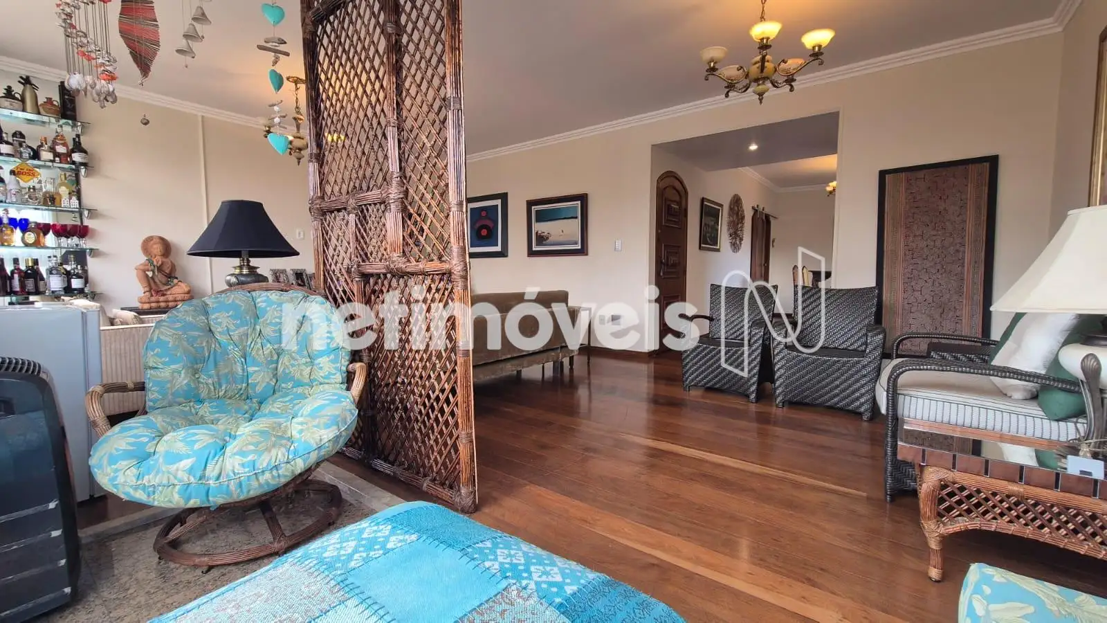 Sala vários ambientes com varanda integrada