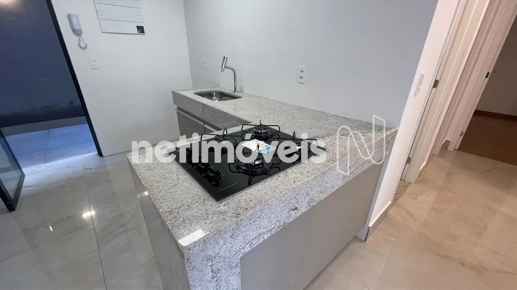 Pia em granito com cook top 