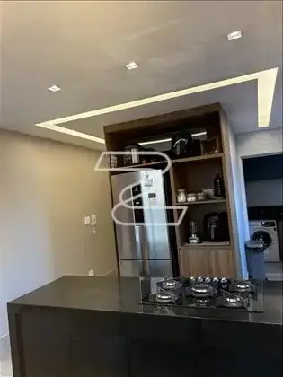 Cozinha com Ilha e Torre Quente