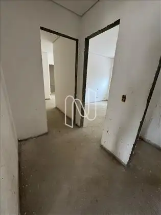 Corredor com espaço para rouparia 