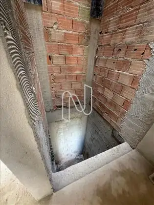 Casa de 3 andares com elevador  