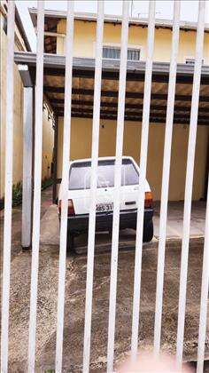 Garagem coberta, livre e demarcada 