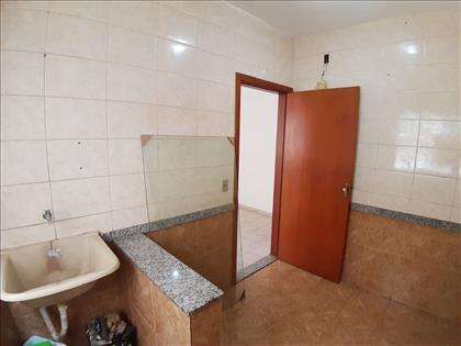 Área de serviço e cozinha