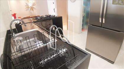 Cozinha com bancada granito em L