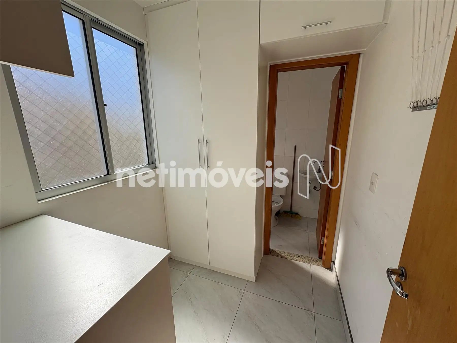 Área de serviço com armários