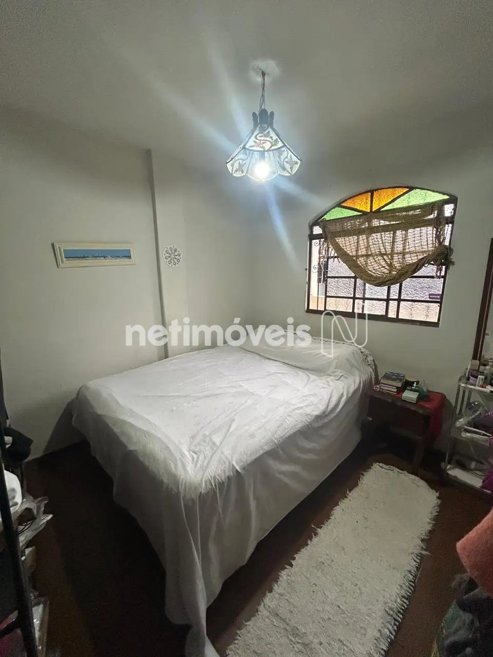 Quarto casal vista janela