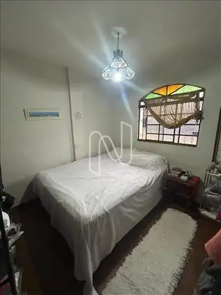 Quarto casal vista janela 