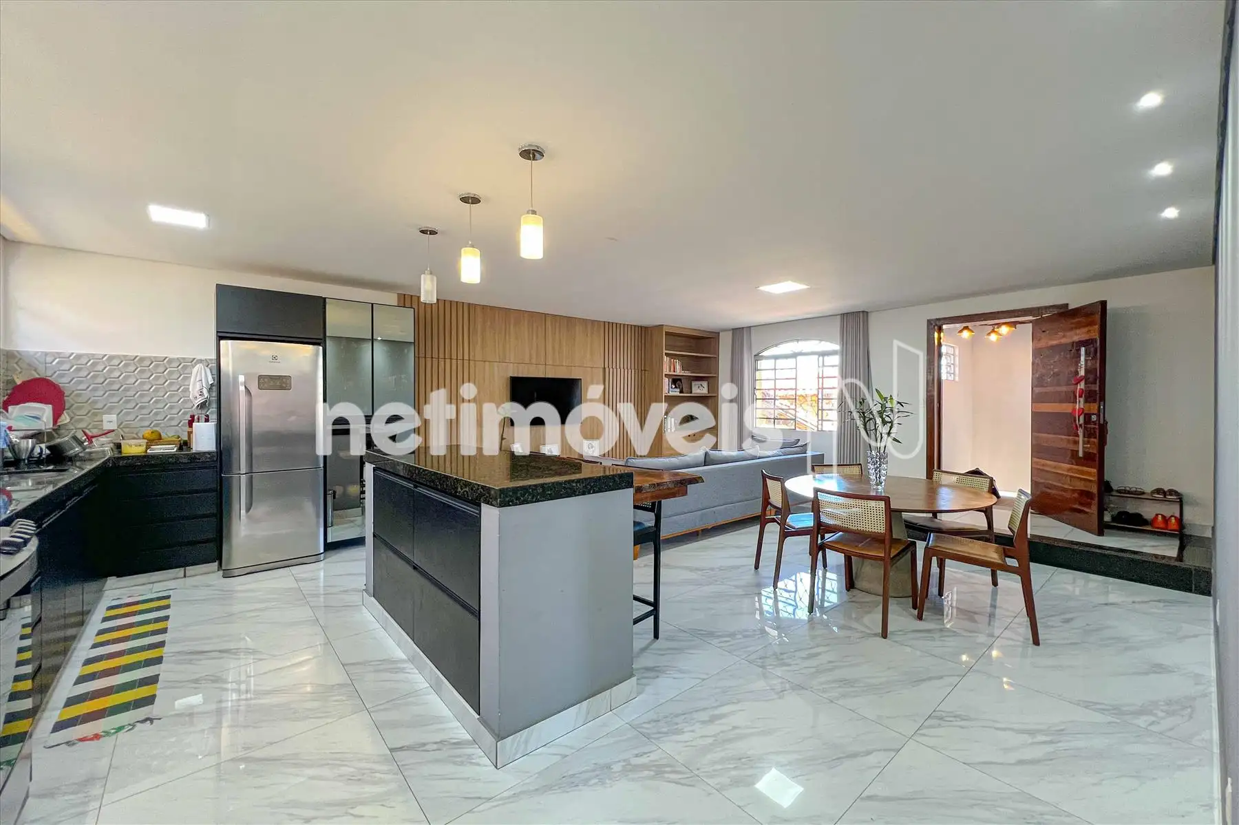 Sala conjugada à cozinha americana