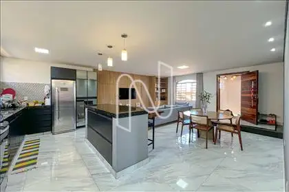 Sala conjugada à cozinha americana