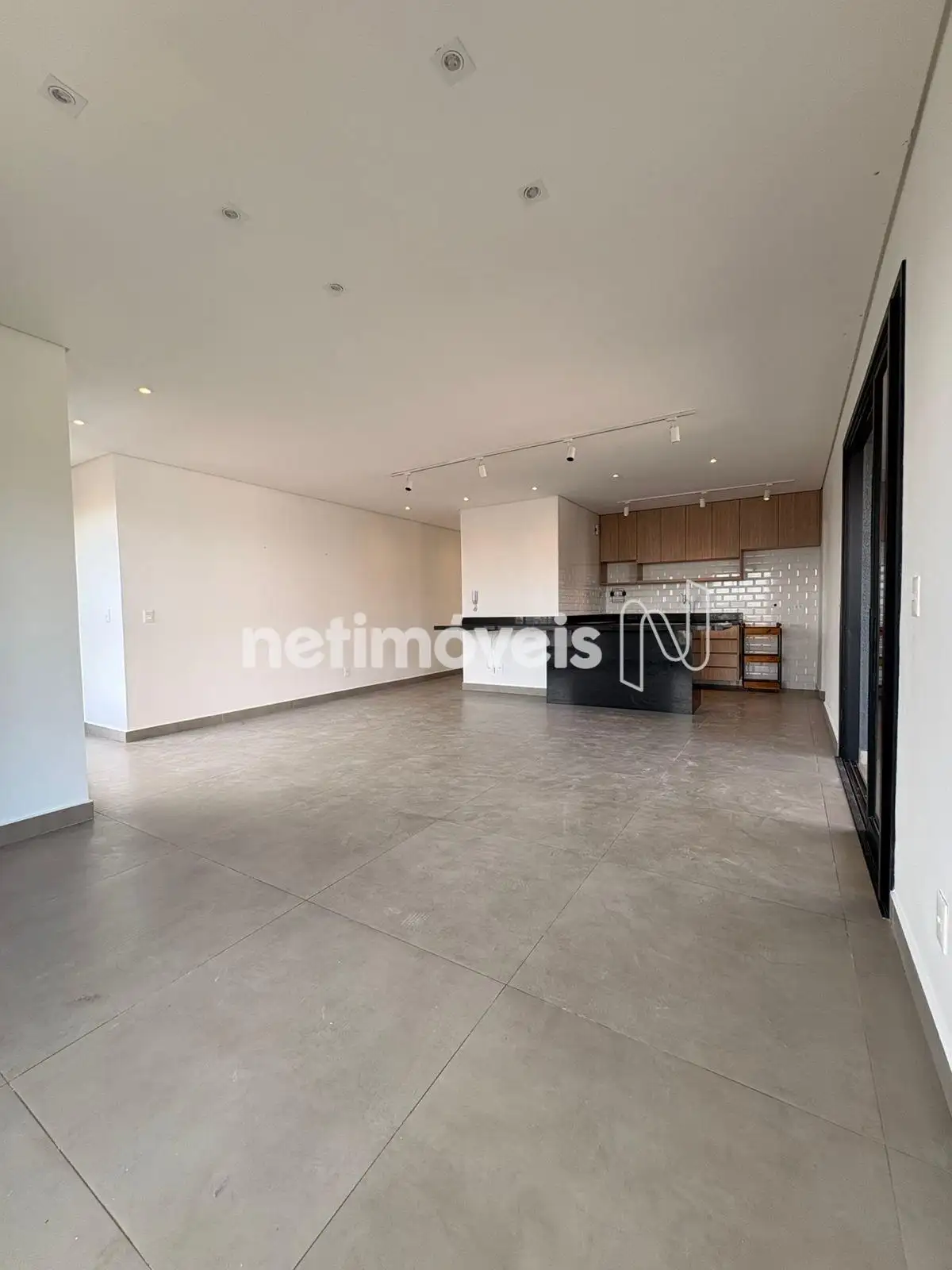 Sala integrada com cozinha americana