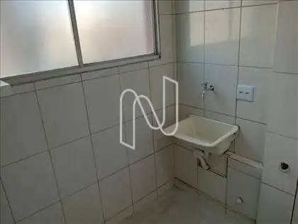 Área  