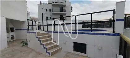  área da piscina e churrasqueira