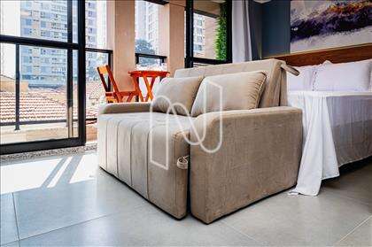 dormitorio com sofá