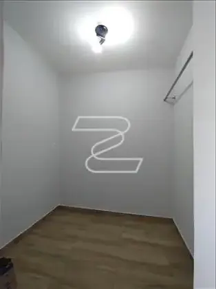 QUARTO NA ÁREA DE SERVIÇO