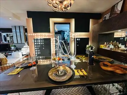 sala de jantar com vista para cozinha 