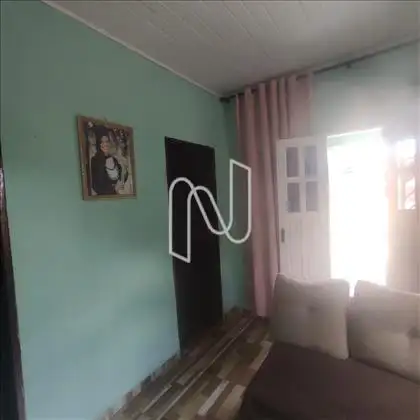  A frente da primeira casa
