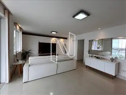 Salão em dois ambientes com vista para o mar 