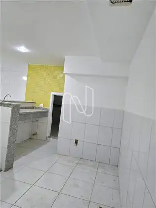 Cozinha em conceito aberto com a sala