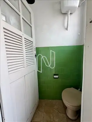 Baneiro de apoio área externa fundos. 